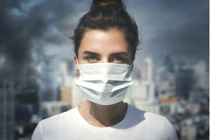 Lady in mask due to pollution 