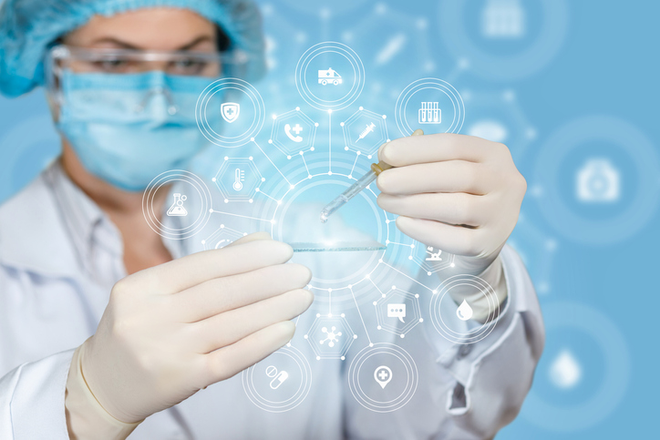 A laboratory assistant is operating with pipette and sample on flat glass with the total medical service and scientific unit system. The concept of innovative researches and medicine correlation.