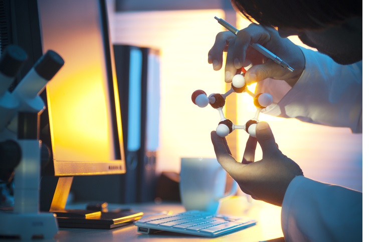 Scientist looking at atoms in the sun 