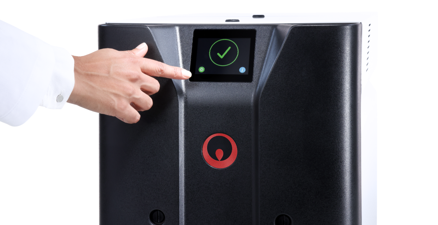 Scientist turning on MEDIA BIOX via the touch feature