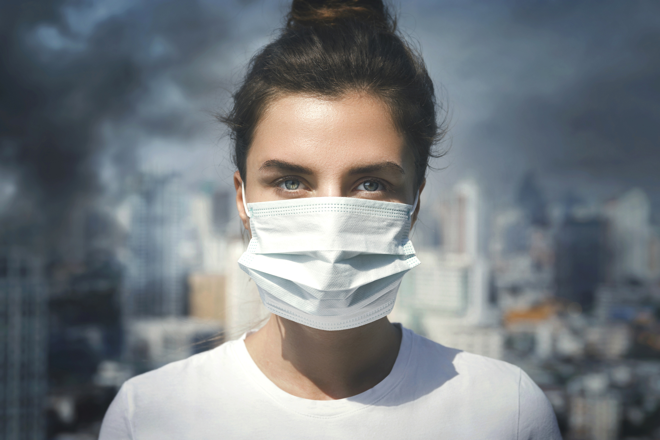 Lady in mask due to pollution 