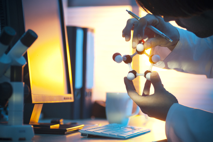 Scientist looking at atoms in the sun 