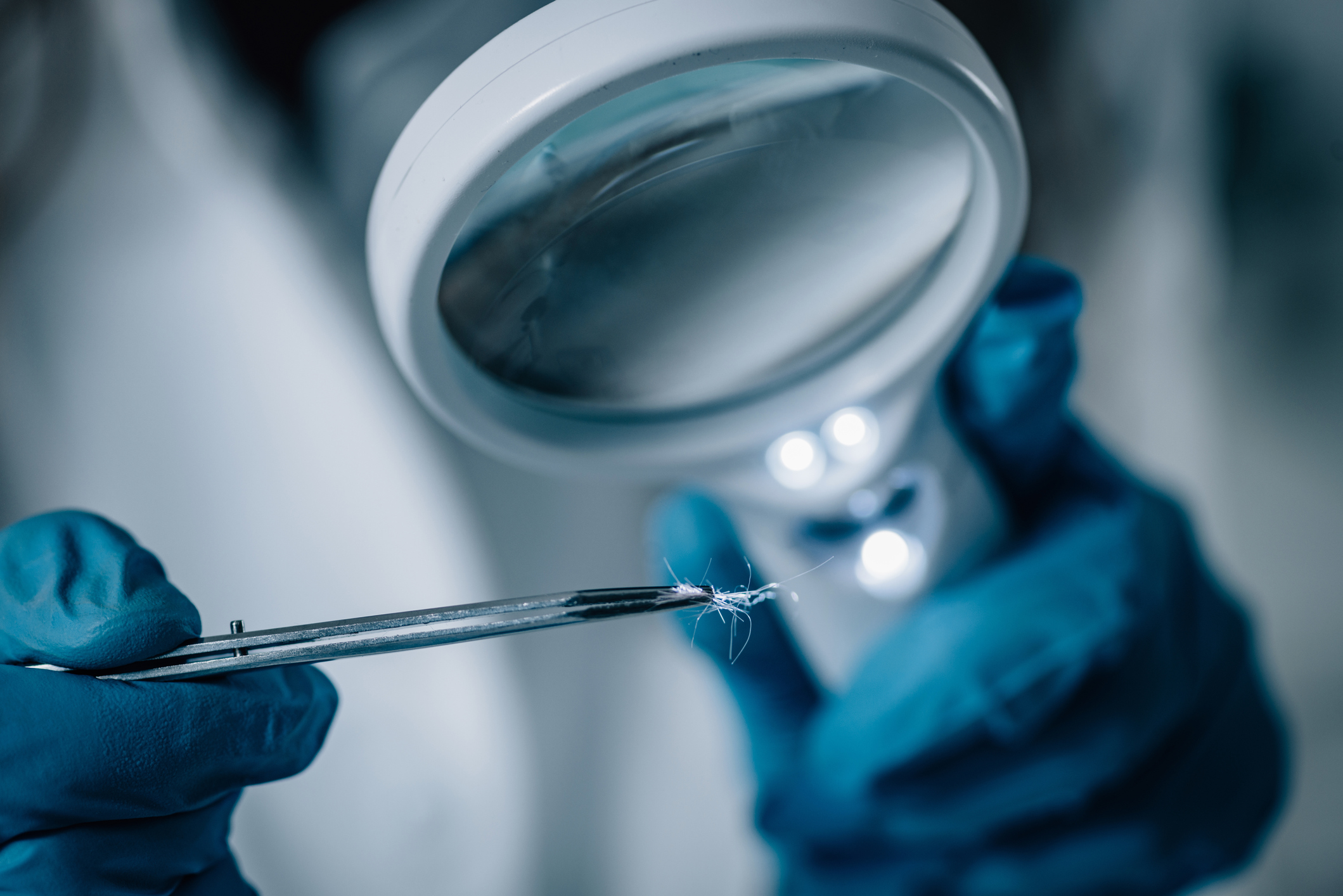 Forensic Science in Lab. Forensic scientist working with DNA sample