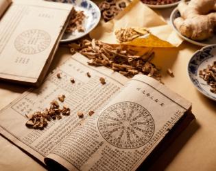 Ancient Chinese medical books in the Qing Dynasty, the Chinese herbal medicine on the table